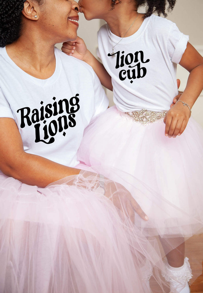 Naupaka Trading Co. T-Shirts Raising Lions Adult Tee (black ink)