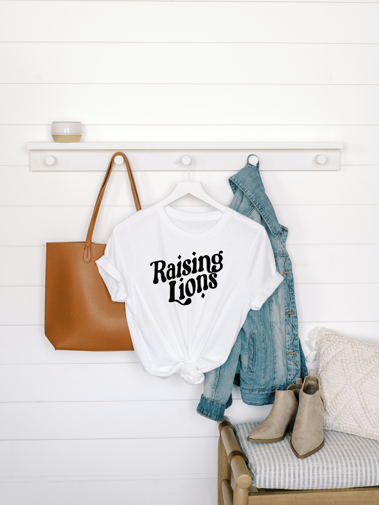 Naupaka Trading Co. T-Shirts Raising Lions Adult Tee (black ink)